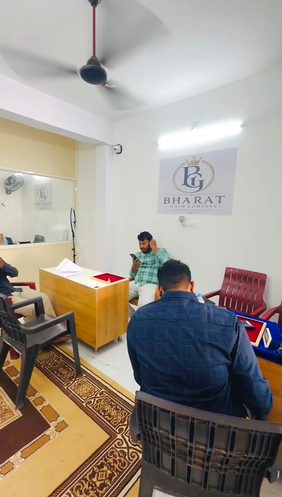 Inside the Bharat Gold office in Rayachoti with customers seated at the counter